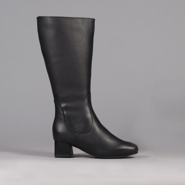Flat rider knee length boot, knee-high silhouette, comfortable low heel and round toe. butter-soft leather