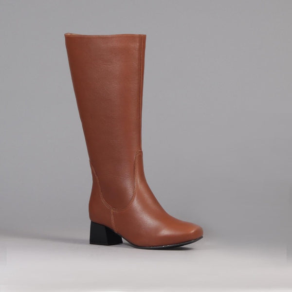 Flat rider knee length boot, knee-high silhouette, comfortable low heel and round toe. butter-soft leather