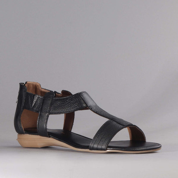 Factory Shop T-Bar Flat Sandal in Black - 12563 - side angle. 